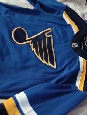 Fanatics Blue White and Yellow NHL Team Jersey Tag Detail